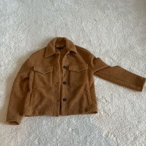 Worn once, excellent condition. Waist length, tan jacket.